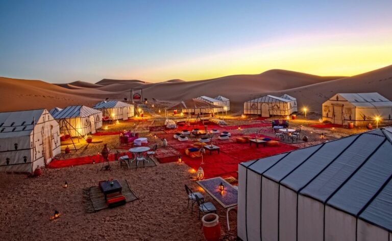 Merzouga desert camp — Dahbi Morocco Tours guests at night